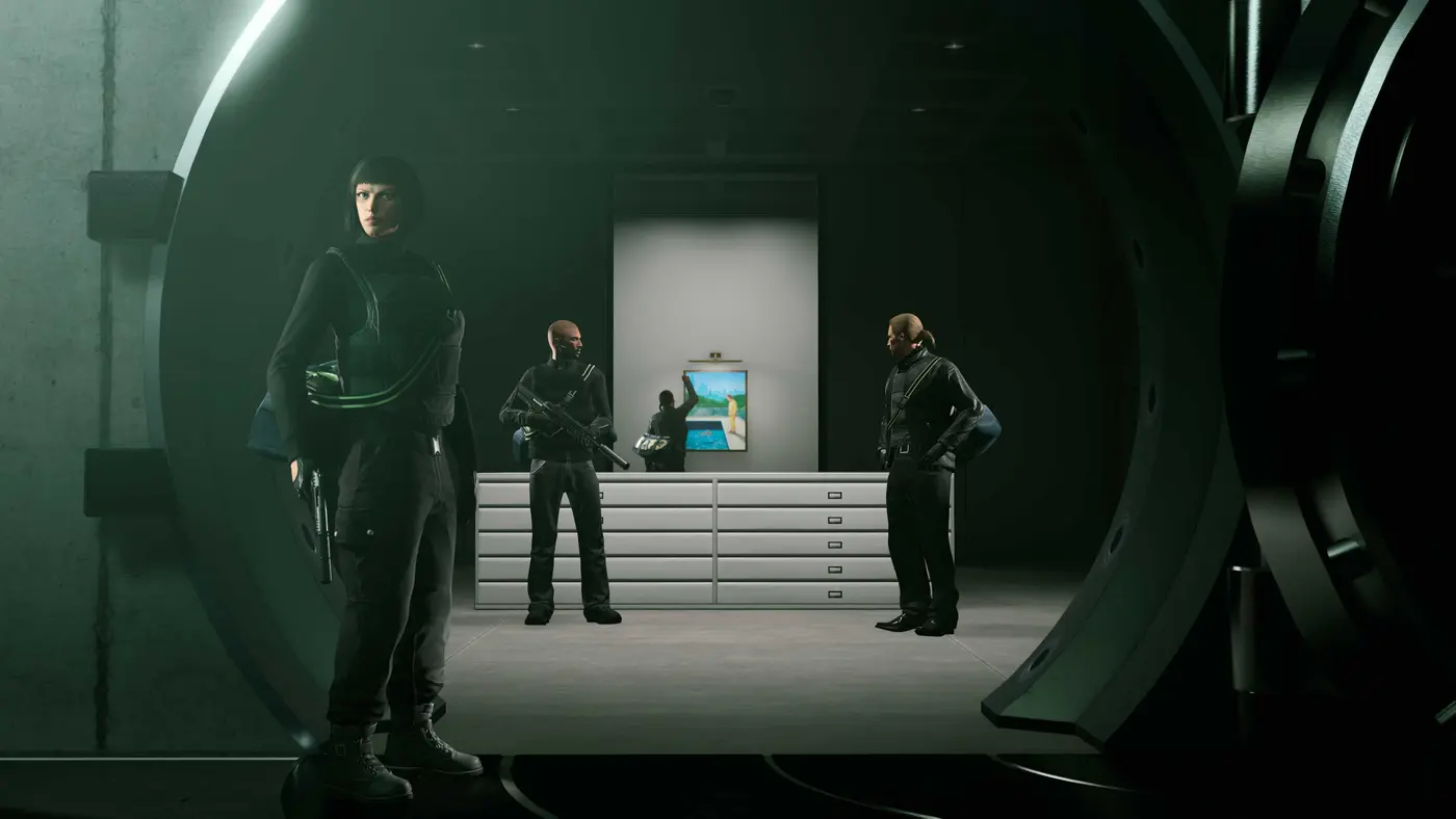 Official GTA Online screenshot: inside the Kortz Center vault, its thick circular blast door swung open, three robbers in black tactical gear stand watch while a fourth lifts a painting off the back wall