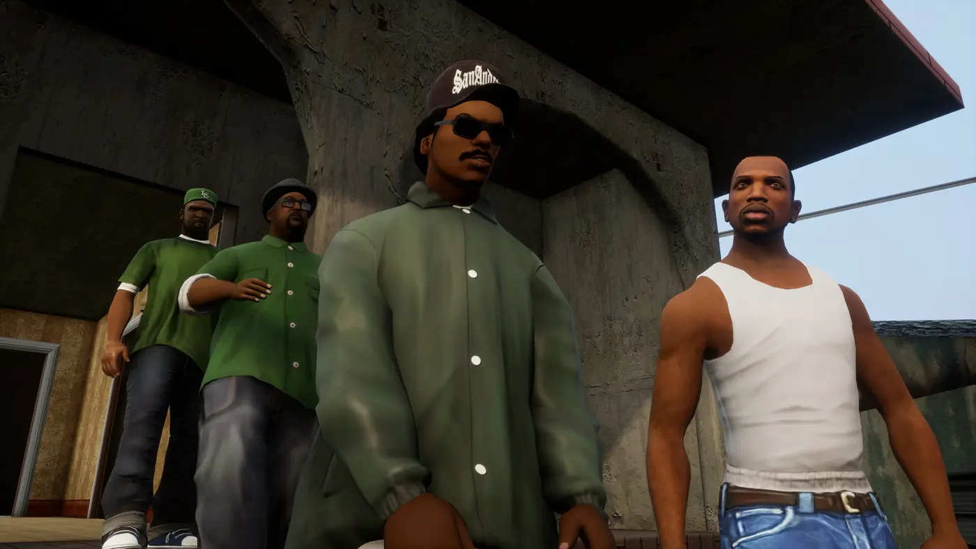Carl CJ Johnson in a white tank top on the right, alongside three Grove Street Families members in green, in front of a concrete wall in GTA San Andreas Definitive Edition
