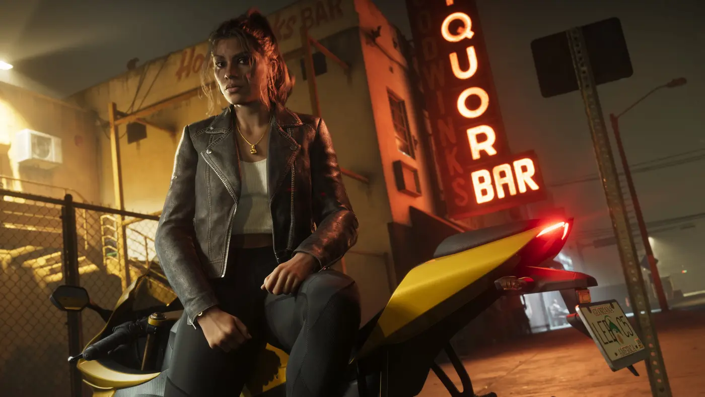 Lucia Caminos sitting on a yellow motorcycle at night, in front of a small store whose red neon sign reads Liquor Bar, on a foggy Leonida street