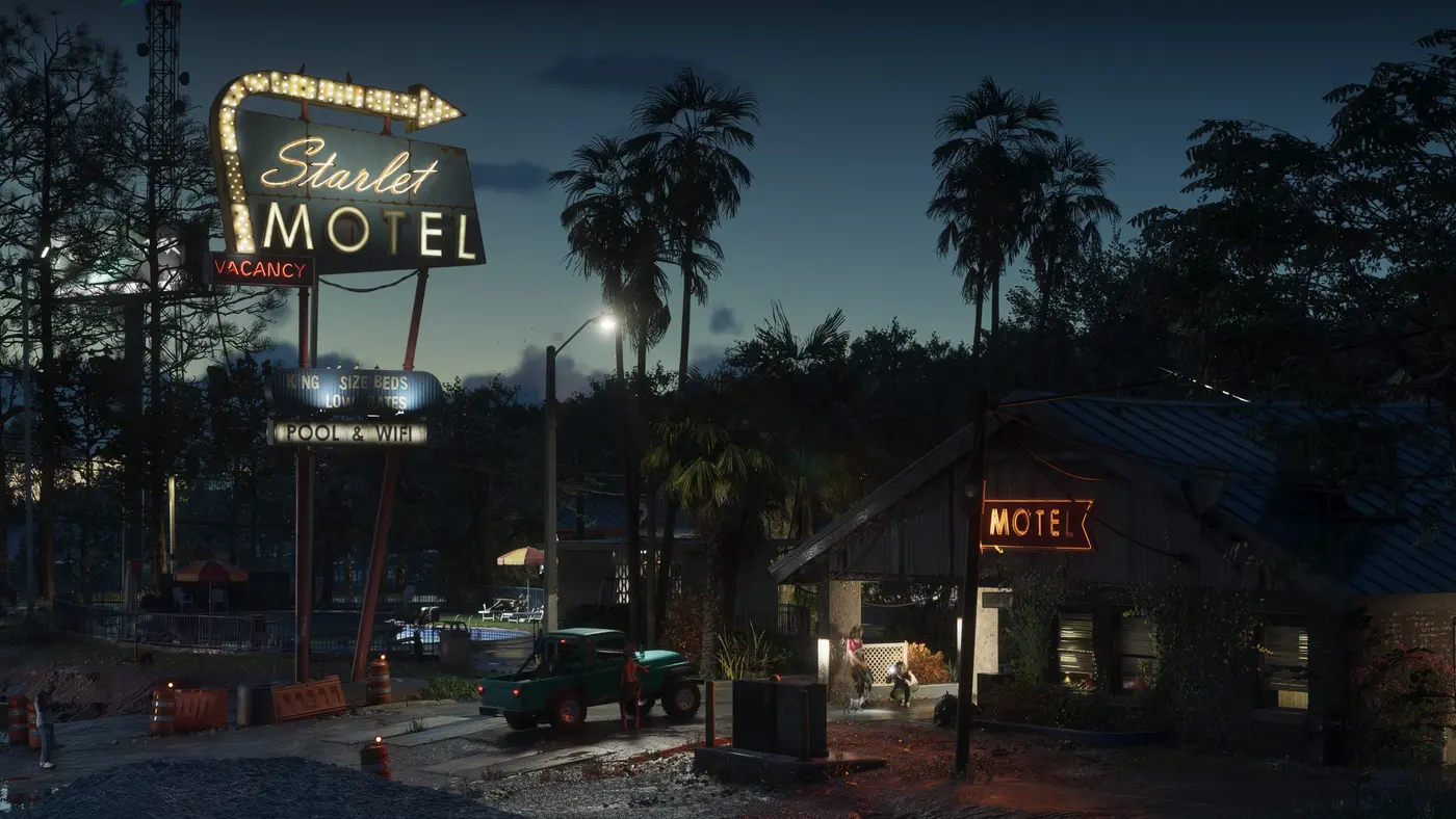 Neon sign for the Starlet Motel in GTA VI at dusk, with VACANCY, KING SIZE BEDS LOW RATES and POOL & WIFI boards above a palm-lined motel